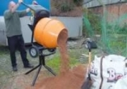 Portable drum cement mixer with stand