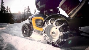 Snow blower with yellow housing and auger.